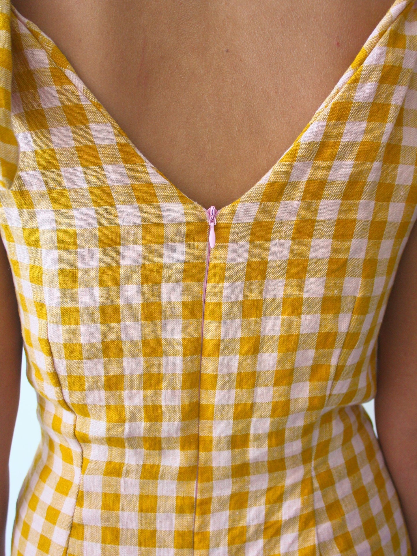 Ethically made sustainable linen gingham check pink and yellow mini dress