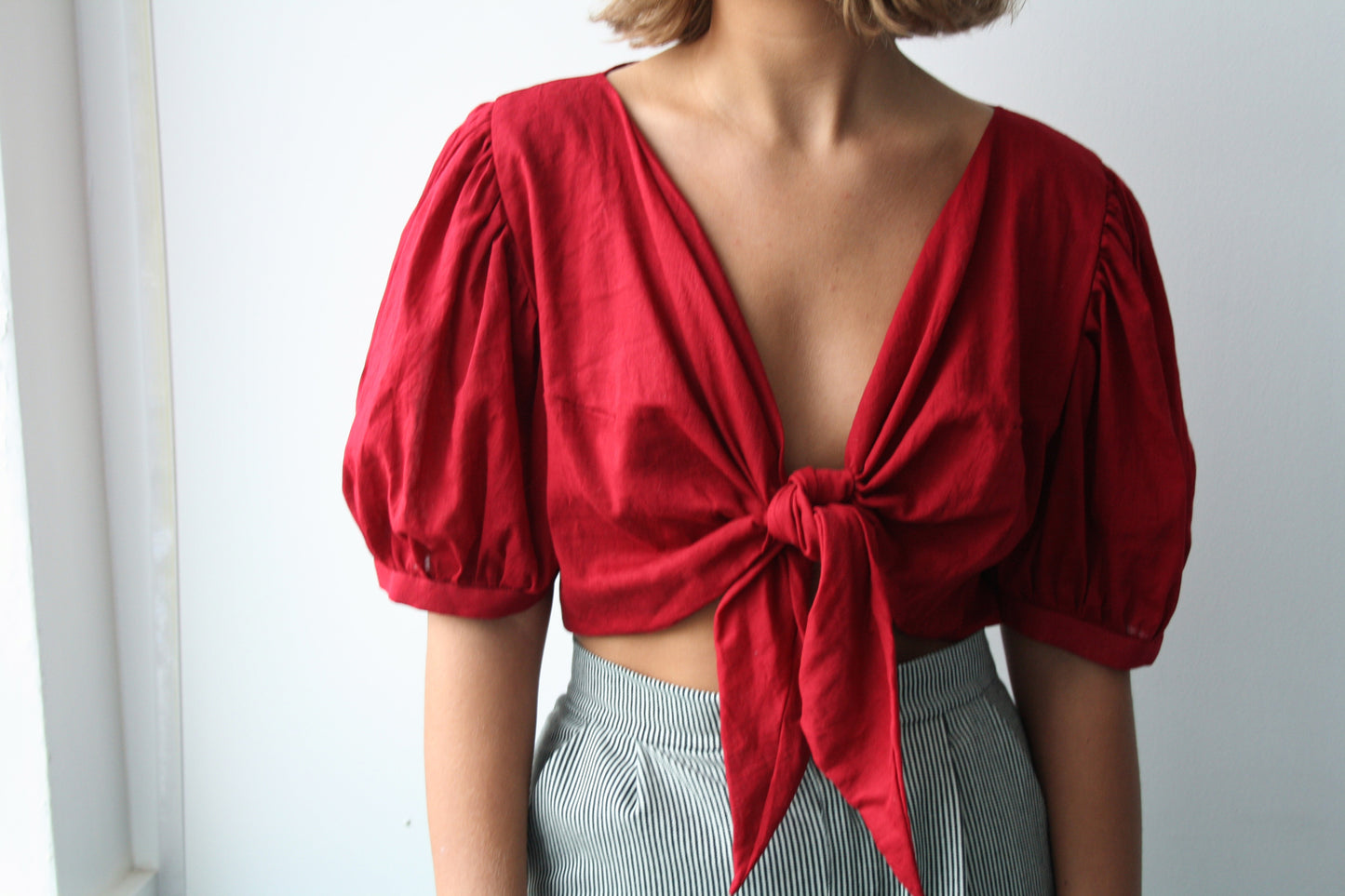 Ethically made organic muslin red puff sleeve tie front crop top