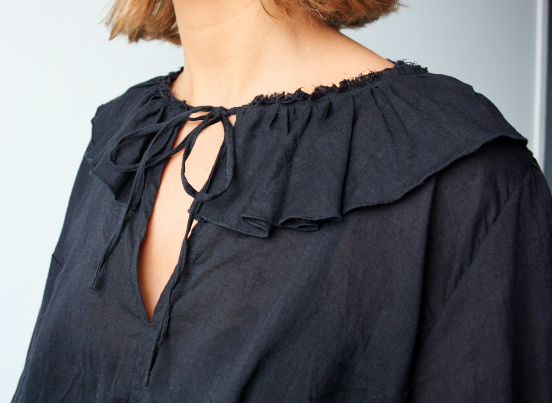 Ethically made organic black muslin ruffle blouse