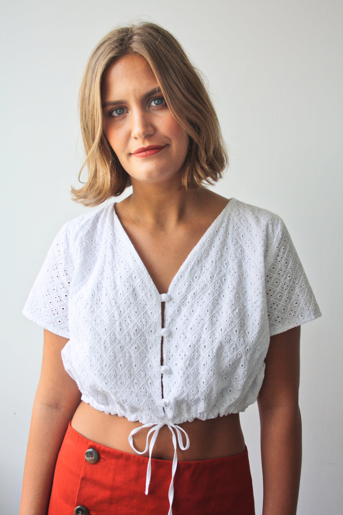 Ethical organic cotton white broderie anglaise cropped blouse 
