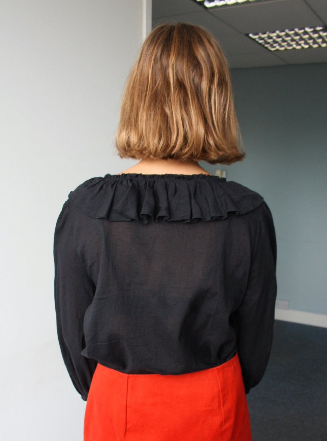 Ethically made organic black muslin ruffle blouse